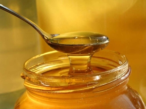  What happens to honey when heated?