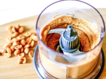  Mixing ingredients in a blender for peanut butter