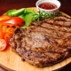 Secrets of cooking beef steaks in the oven